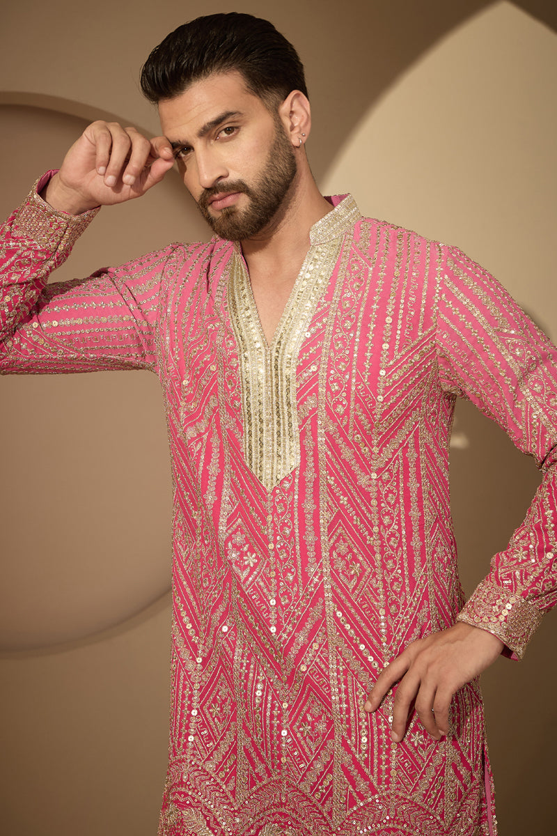 Pink Georgette Ethnic Motifs Embroidered V-Neck Kurta With Trouser MKSET2587