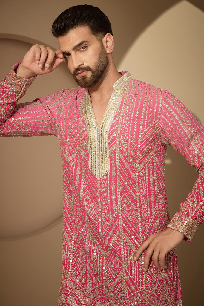 Pink Georgette Ethnic Motifs Embroidered V-Neck Kurta With Trouser MKSET2587