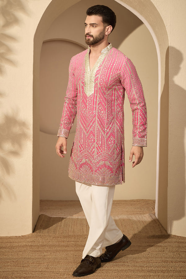 Pink Georgette Ethnic Motifs Embroidered V-Neck Kurta With Trouser MKSET2587