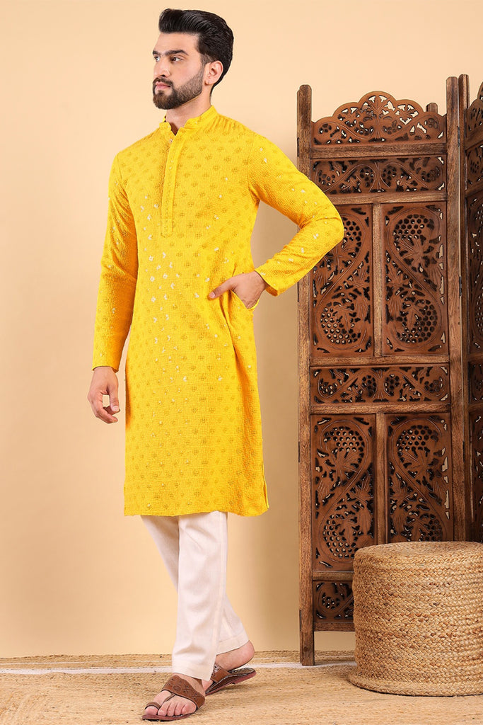 Yellow Viscose Rayon Solid Embroidered Straight Kurta with Trousers MKSET1010YLW