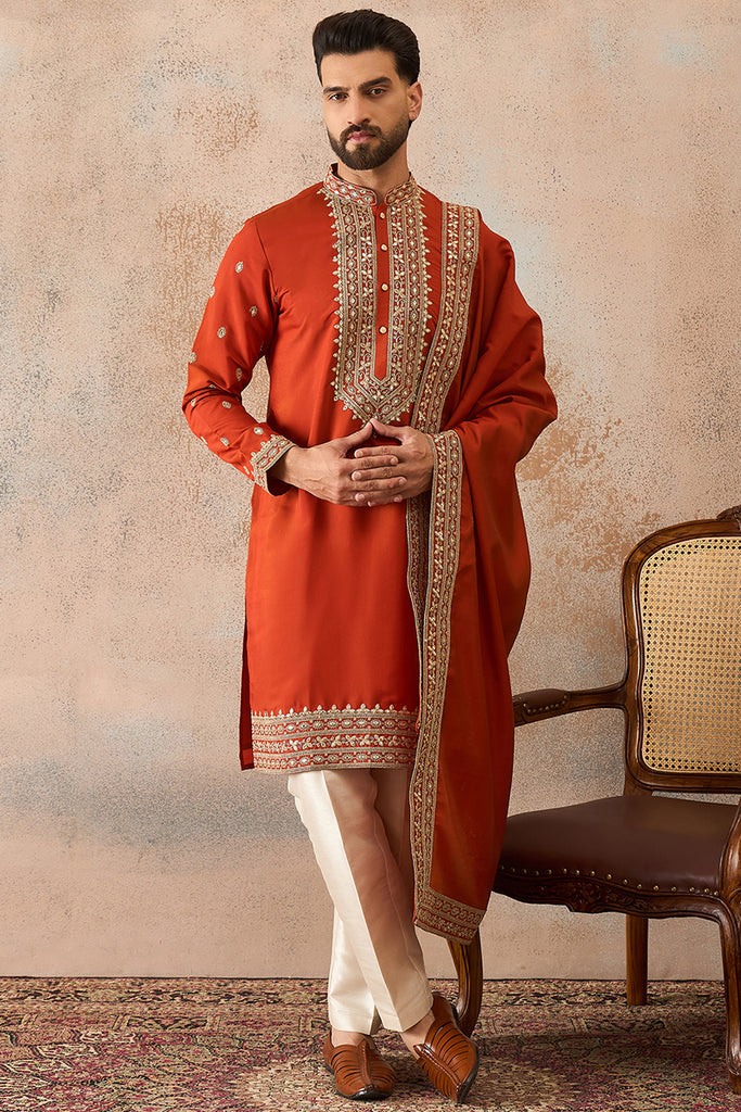 Orange Silk Blend Solid Embroidered Kurta And Trouser With Dupatta MKPD1028