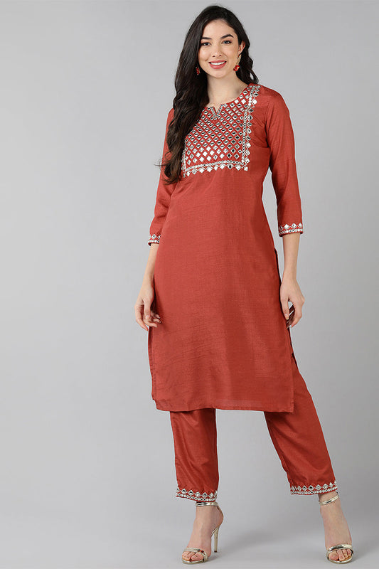  Women Coral Embroidered Kurta With Trousers 