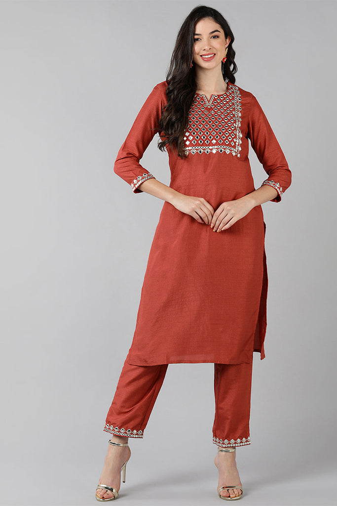  Women Coral Embroidered Kurta With Trousers 