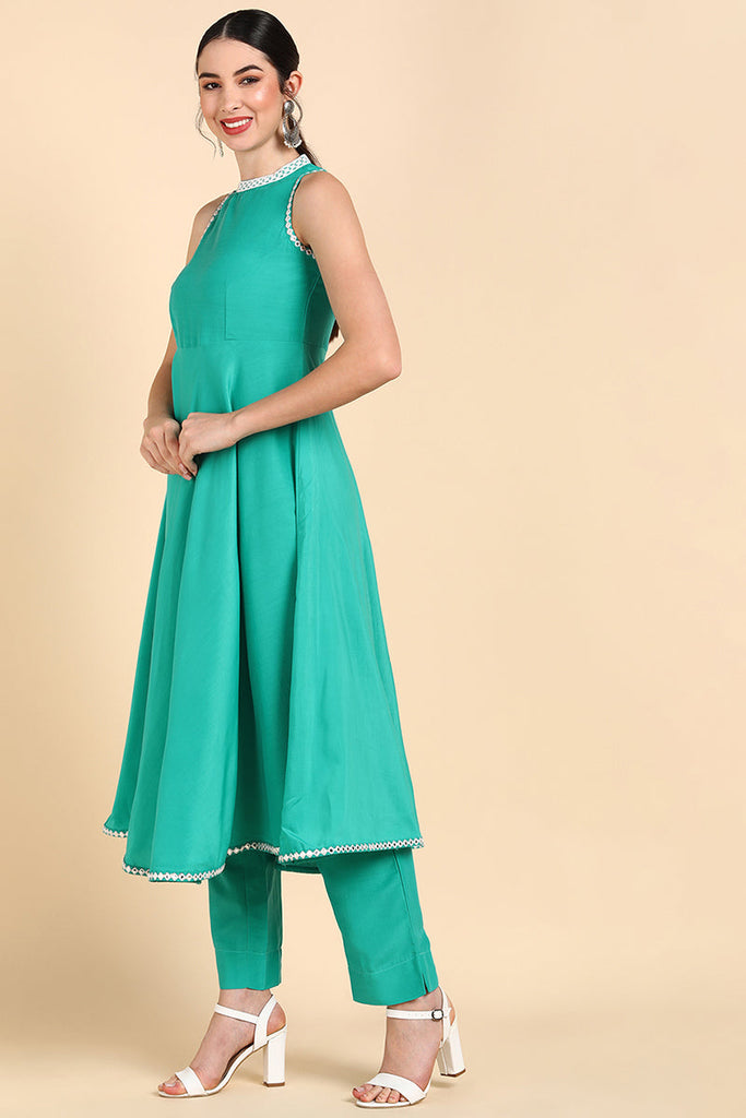  Women Sea Green Solid Kurta Trousers With Dupatta 